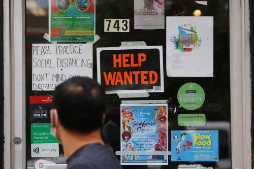 US labor market steadily cooling amid higher job openings, low layoffs